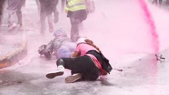 People fall as they run after police use water cannon to disperse protesters during a demonstration against Kenya's proposed finance bill 2024/2025 in Nairobi, Kenya, June 20, 2024. REUTERS/File Photo