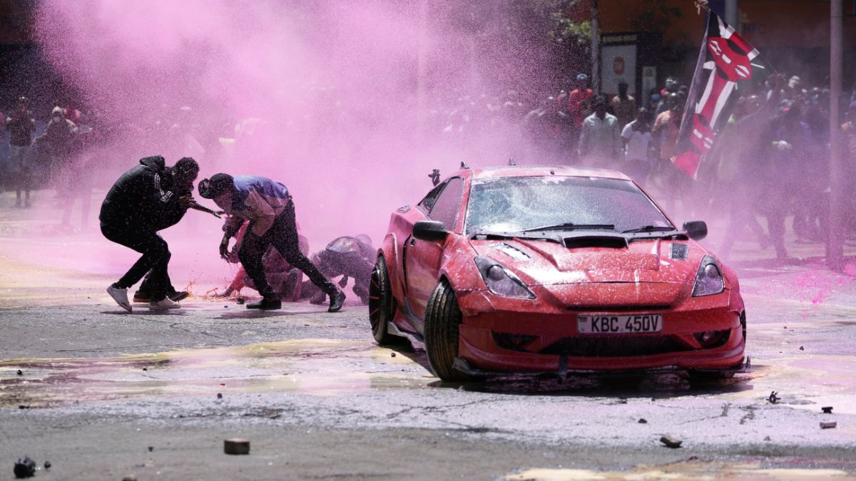 Protesters scatter as Kenya police sprays water cannon at them during a protest over proposed tax hikes in a finance bill in downtown Nairobi, Kenya Tuesday, June 25, 2024. Photo- AP Protesters scatter as Kenya police sprays water cannon at them during a protest over proposed tax hikes in a finance bill in downtown Nairobi, Kenya Tuesday, June 25, 2024. Photo- AP