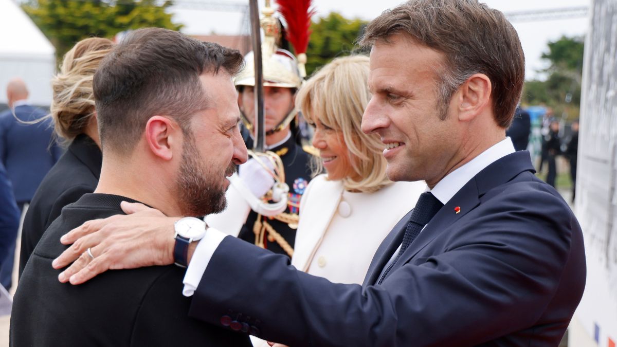 Ukrainian President Volodymyr Zelenskyy, left is greeted by French President Emmanuel Macron, at the international ceremony at Omaha Beach, near Saint-Laurent-sur-Mer. Thursday, June 6, 2024. - AP Ukrainian President Volodymyr Zelenskyy, left is greeted by French President Emmanuel Macron, at the international ceremony at Omaha Beach, near Saint-Laurent-sur-Mer. Thursday, June 6, 2024. - AP