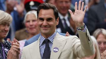Roger Federer acknowledges the crowd as he is given a tribute at the Centre Court, on the second day of the 2023 Wimbledon Championships at The All England Tennis Club. AFP
