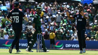 USA's Saurabh Netravalkar (R) bowled a stellar Super Over to deny Pakistan a win in the T20 World Cup. AFP