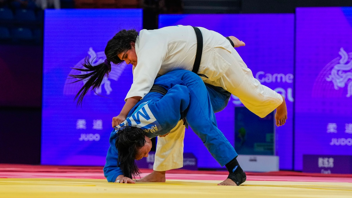 Tulika Maan (white) and Mongolia's Adiyasuren Amarsaikhan at the 19th Asian Games, in Hangzhou, China. PTI File Photo Tulika Maan (white) and Mongolia's Adiyasuren Amarsaikhan at the 19th Asian Games, in Hangzhou, China. PTI File Photo