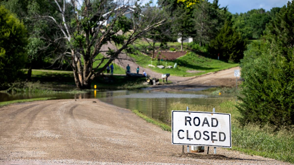 A road is closed off due to flooding caused by heavy rainfall, 22 June, 2024, in Lincoln County, South Dakota, USA. AP A road is closed off due to flooding caused by heavy rainfall, 22 June, 2024, in Lincoln County, South Dakota, USA. AP