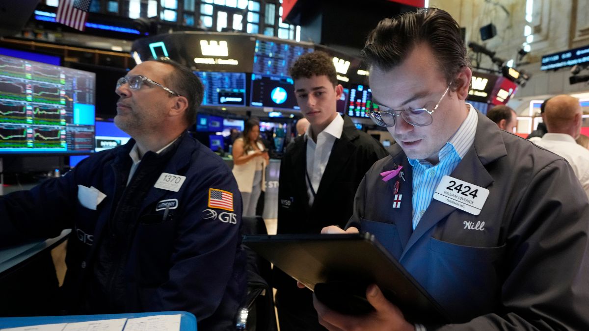 Stock indices in the United States hovered around record levels on Wednesday. AP Stock indices in the United States hovered around record levels on Wednesday. AP