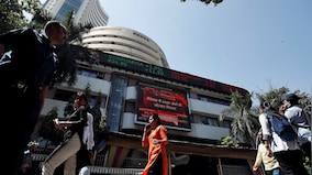 What market analysts are saying about trends as Modi's lead narrows in early counting