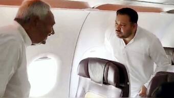 Nitish Kumar and Tejashwi Yadav. PTI