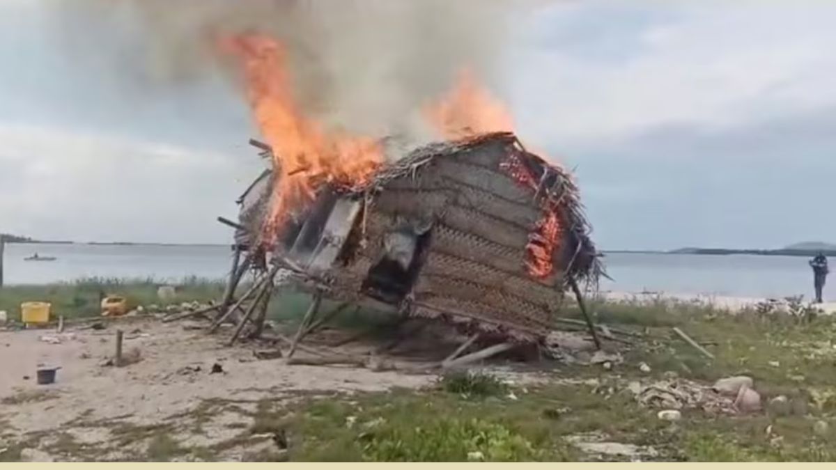 Smoke rises as a house is demolished in Tun Sakaran Marine Park, Sabah, Malaysia, in this screen grab obtained from a social media video, released on June 4, 2024. Video obtained by Reuters Smoke rises as a house is demolished in Tun Sakaran Marine Park, Sabah, Malaysia, in this screen grab obtained from a social media video, released on June 4, 2024. Video obtained by Reuters