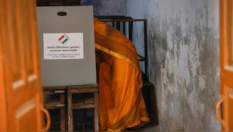 (File) A woman casts her vote at a polling station, Reuters