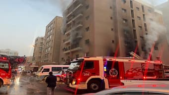Smoke billows after a fire broke out in a building, in Mangaf, Kuwait, Wednesday, 12 June 2024. Network18/File Photo