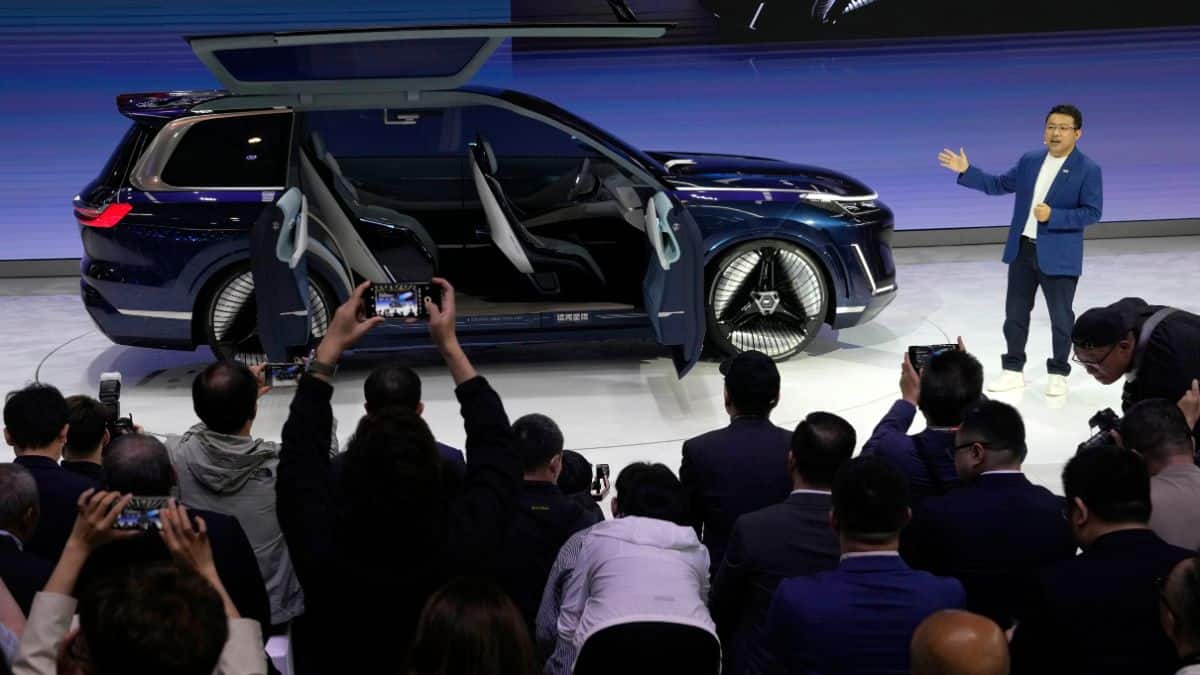 Jerry Gan, CEO of Geely Auto Group unveils the Galaxy Starship a new technology flagship AI-driven SUV prototype during Auto China 2024 in Beijing, 25 April, 2024. AP