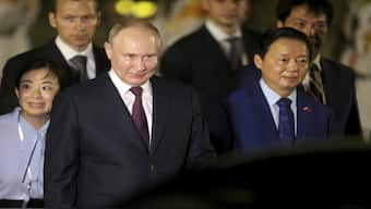 Russian President Vladimir Putin and Vietnamese Deputy Prime Minister Tran Hong Ha walk together after Putin’s arrival at the Noi Bai International Airport in Hanoi, Vietnam. AP File