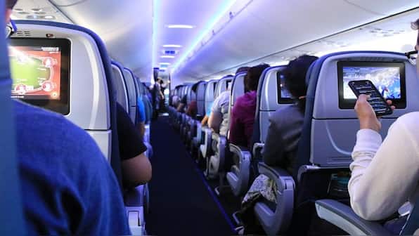What is ‘raw-dogging’ on flights, the latest travel trend?