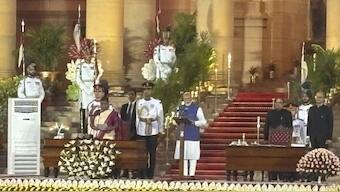 Narendra Modi takes oath as prime minister at Rashtrapati Bhavan, in New Delhi. AP