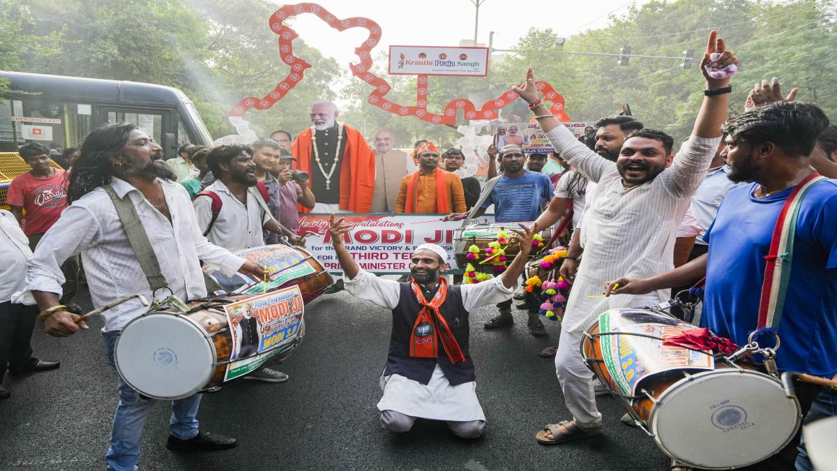 BJP workers celebrate the party's win in the Lok Sabha elections, at the party office, in New Delhi. PTI BJP workers celebrate the party's win in the Lok Sabha elections, at the party office, in New Delhi. PTI