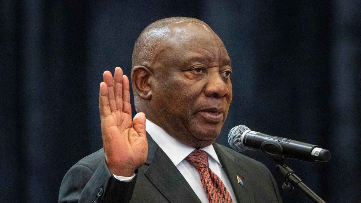 South African President Cyril Ramaphosa raises his hand as he is sworn is as a member of Parliament ahead of an expected vote by lawmakers to decide if he is reelected as leader of the country in Cape Town, South Africa, 14 June, 2024. Source: File Image / AP South African President Cyril Ramaphosa raises his hand as he is sworn is as a member of Parliament ahead of an expected vote by lawmakers to decide if he is reelected as leader of the country in Cape Town, South Africa, 14 June, 2024. Source: File Image / AP