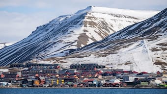 Pictured taken on May 16, 2024 from a boat shows the view of Longyearbyen, located on Spitsbergen island, in Svalbard Archipelago, northern Norway. AFP