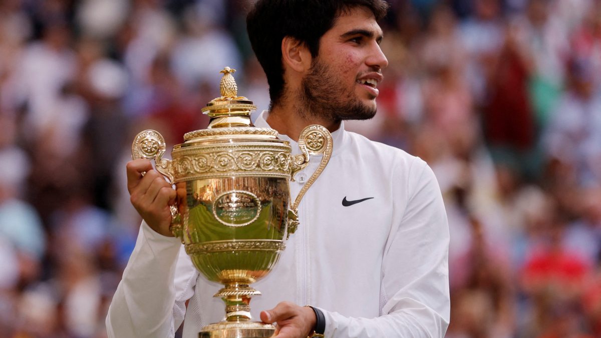 Spain's Carlos Alcaraz with the Wimbledon men's singles trophy after his triumph in 2023. Reuters Spain's Carlos Alcaraz with the Wimbledon men's singles trophy after his triumph in 2023. Reuters