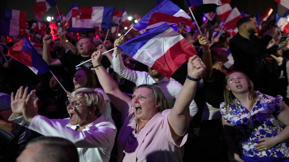 Supporters of French far right leader Marine Le Pen react after the release of projections based on the actual vote count in select constituencies , Sunday, June 30, 2024 in Henin-Beaumont, northern France. AP Supporters of French far right leader Marine Le Pen react after the release of projections based on the actual vote count in select constituencies , Sunday, June 30, 2024 in Henin-Beaumont, northern France. AP
