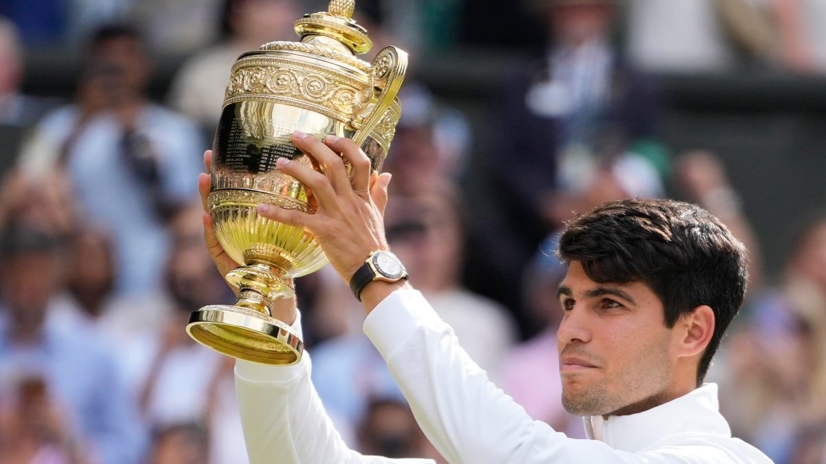 Wimbledon 2024: Carlos Alcaraz defends men's singles title with straight sets win over Novak Djokovic in final