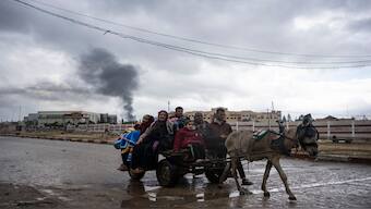 Palestinians flee from the city of Khan Younis in southern Gaza after an Israeli ground and air offensive on Monday, January 29, 2024. AP