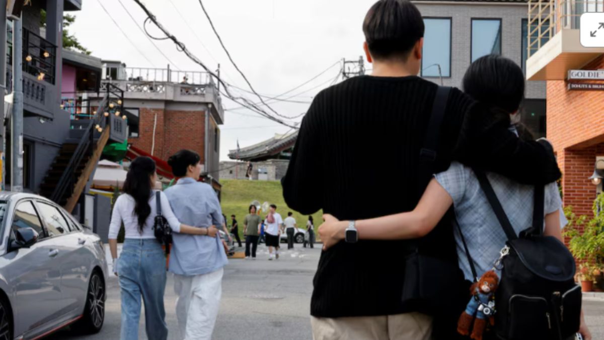 Kim Eun-ha, 33, and her lesbian partner Park Cho-hyeon, 28, walk on a street in Suwon, South Korea. File Photo- Reuters Kim Eun-ha, 33, and her lesbian partner Park Cho-hyeon, 28, walk on a street in Suwon, South Korea. File Photo- Reuters