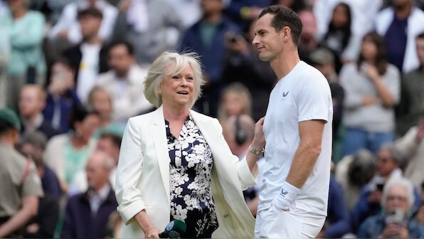 Wimbledon pays tribute to Andy Murray despite doubles exit as Novak Djokovic wins