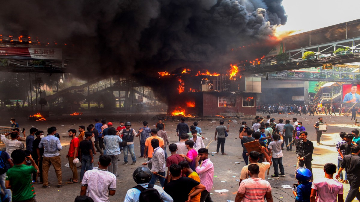 Anti-quota protesters clash with the police in Dhaka. AFP Anti-quota protesters clash with the police in Dhaka. AFP