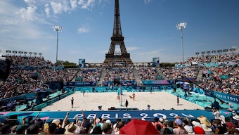 General view of the Eiffel Tower Stadium is showing the Eiffel Tower with the the Olympic rings as spectators in the stands watch a match, Paris, France, July 31, 2024. File Image/Reuters