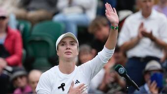 Elina Svitolina of Ukraine waves after beating Xinyu Wang of China in the fourth round of Wimbledon. AP