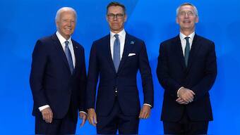 President Joe Biden, left, and NATO Secretary General Jens Stoltenberg, right, greet Alexander Stubb, President of Finland, as they arrive for a welcome ceremony at the NATO summit in Washington, Wednesday, July 10, 2024. Photo- AP