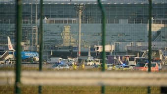 Police, security and medical staff parked their vehicles after activists of the "Letzte Generation" (Last Generation) staged a demonstration near the runways at the airport in Frankfurt, Germany July 25, 2024. Photo- Reuters