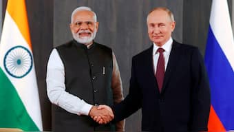 Russian President Vladimir Putin, right, and Indian Prime Minister Narendra Modi File Photo- AP