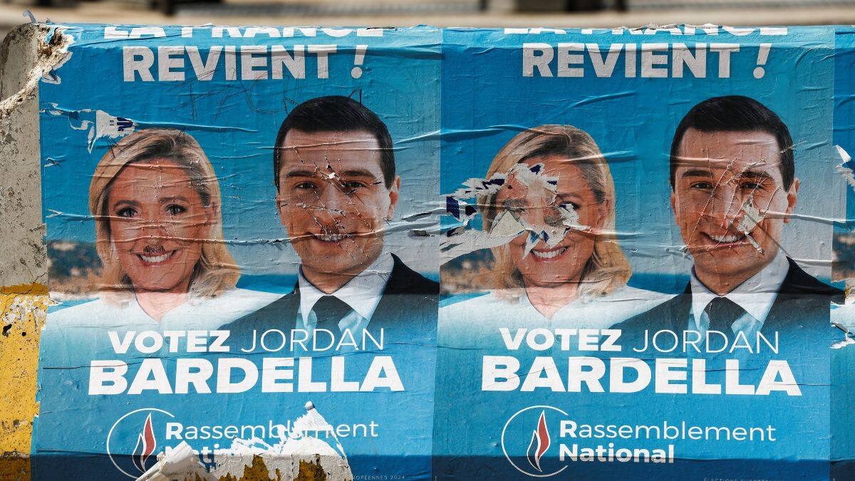 Election posters of the French far-right National Rally (Rassemblement National - RN) party with pictures of their leaders Marine Le Pen and Jordan Bardella are seen near the RN party headquarters before the second round of the early French parliamentary elections, in Paris, France, July 5, 2024. Reuters