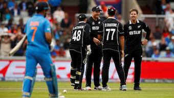 Martin Guptill and New Zealand cricketers celebrate the wicket of MS Dhoni during the 2019 ODI World Cup. Reuters