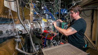 A scientist from Lawrence Berkeley National Laboratory working on a separator during the experiment. Image Credit: Lawrence Berkeley National Laboratory