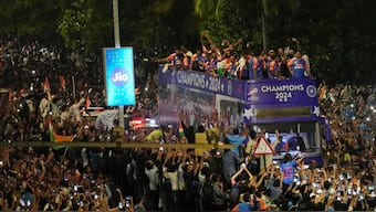 The Indian team received a grand welcome in the form of an open-top bus parade through Mumbai's Marine Drive that was followed by a felicitation ceremony at the Wankhede Stadium. AP