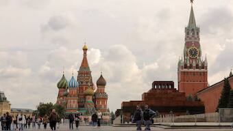People walk across Red Square near St. Basil's Cathedral and the Kremlin's Spasskaya Tower in central Moscow, Russia September 21, 2022. Source: REUTERS.