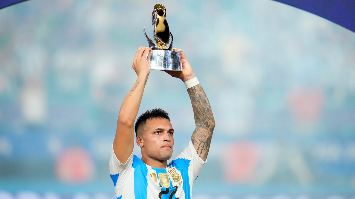 Lautaro Martínez celebrates with the Golden Boot trophy after Argentina beat Colombia in the Copa America final. AP Lautaro Martínez celebrates with the Golden Boot trophy after Argentina beat Colombia in the Copa America final. AP