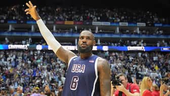 LeBron James waves to the crowd after the end of an exhibition basketball game between the United States and South Sudan at the o2 Arena in London. AP
