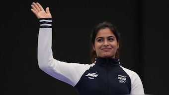 Manu Bhaker waves to the crowd after winning bronze medal at the Paris Olympics. Reuters
