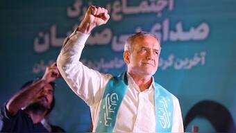 Masoud Pezeshkian waves during a campaign event in Tehran, Iran. Source: REUTERS.