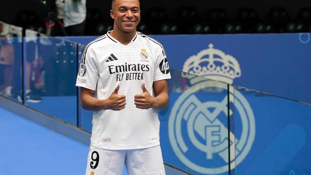 Kylian Mbappe poses for the cameras after being presented to fans as a new Real Madrid player at the Santiago Bernabeu stadium in Madrid. AP Kylian Mbappe poses for the cameras after being presented to fans as a new Real Madrid player at the Santiago Bernabeu stadium in Madrid. AP