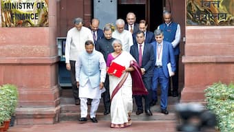 Finance Minister Nirmala Sitharaman holds a folder with the Government of India's logo while leaving her office to present the union budget in the parliament in New Delhi, India, July 23, 2024. Reuters