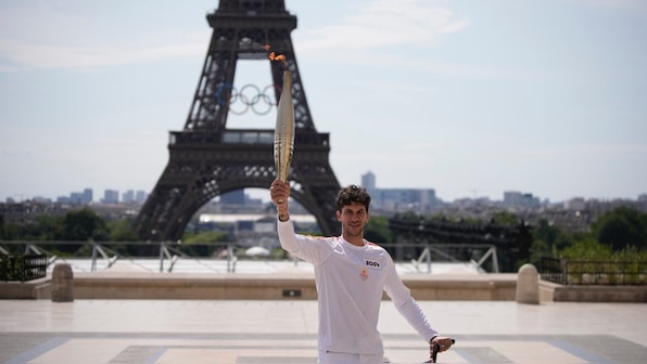 Who is carrying the Olympic torch through Paris? A BTS star, a garbage collector and more