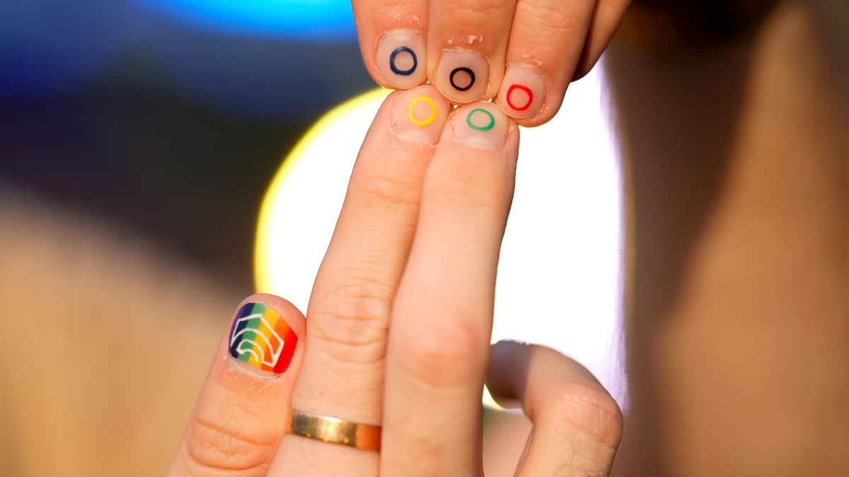 Jeremy Goupille shows his nails painted with the rainbow colors and the Olympic rings at the opening of Pride House during the 2024 Summer Olympics in Paris. AP Jeremy Goupille shows his nails painted with the rainbow colors and the Olympic rings at the opening of Pride House during the 2024 Summer Olympics in Paris. AP