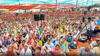 Devotees at the religious gathering where a stampede broke out, in Hathras district, Tuesday, July 2, 2024. PTI