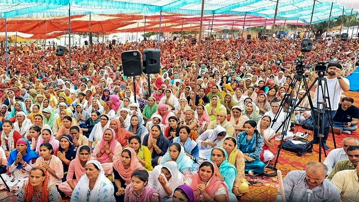 Devotees at the religious gathering where a stampede broke out, in Hathras district, Tuesday, July 2, 2024. PTI Devotees at the religious gathering where a stampede broke out, in Hathras district, Tuesday, July 2, 2024. PTI