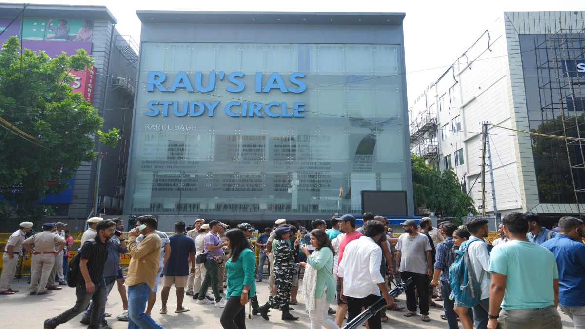 Security personnel stand guard near a UPSC exam coaching centre after three civil services aspirants died when the basement of the coaching centre was flooded by rainwater, in New Delhi, Sunday, July 28, 2024. PTI Security personnel stand guard near a UPSC exam coaching centre after three civil services aspirants died when the basement of the coaching centre was flooded by rainwater, in New Delhi, Sunday, July 28, 2024. PTI