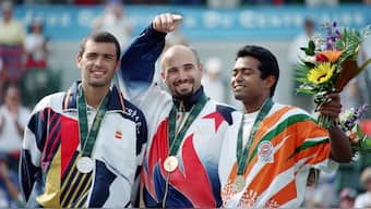 Leander Paes (R) won the bronze medal in singles tennis at the 1996 Atlanta Olympics. AFP