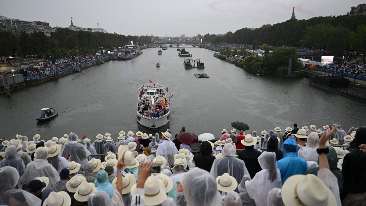 In a departure from tradition, the Paris Olympics opening ceremony featured the parade of the participating nations on boats through River Seine instead of the Olympic stadium. Reuters In a departure from tradition, the Paris Olympics opening ceremony featured the parade of the participating nations on boats through River Seine instead of the Olympic stadium. Reuters